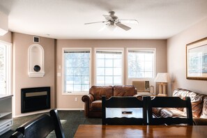 Family Suite, 2 Bedrooms, Balcony, Golf View | Living area | 50-inch flat-screen TV with satellite channels, TV, fireplace