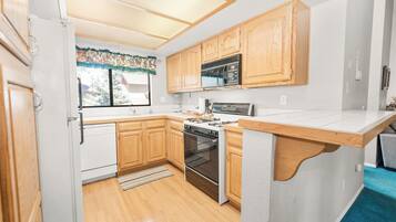 Basic Condo, Multiple Beds, Non Smoking | Private kitchen | Coffee/tea maker