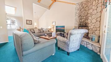 Basic Condo, Multiple Beds, Non Smoking | Living area | Flat-screen TV, DVD player