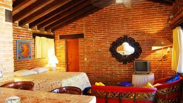 Traditional Studio Suite, 1 Bedroom | Living area | TV