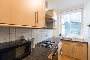 Comfort House, 1 Bedroom | Private kitchen | Full-sized fridge, microwave, oven, stovetop