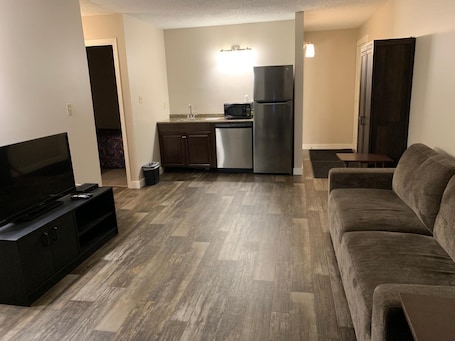 Superior Room | Living room | Flat-screen TV