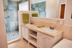 Bathtub, hair dryer, towels