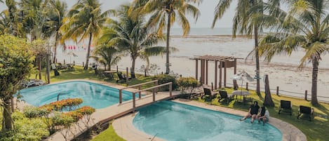 2 outdoor pools, pool umbrellas, sun loungers