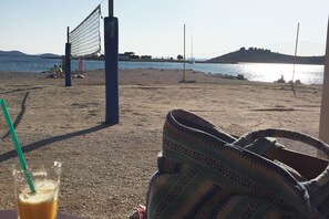 Enjoy a relaxing beachside getaway with volleyball and scenic views.