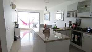 Deluxe Apartment, 2 Bedrooms, Beach View, Beachfront | In-room dining - Bella Cartagena Apartments (Cartagena)