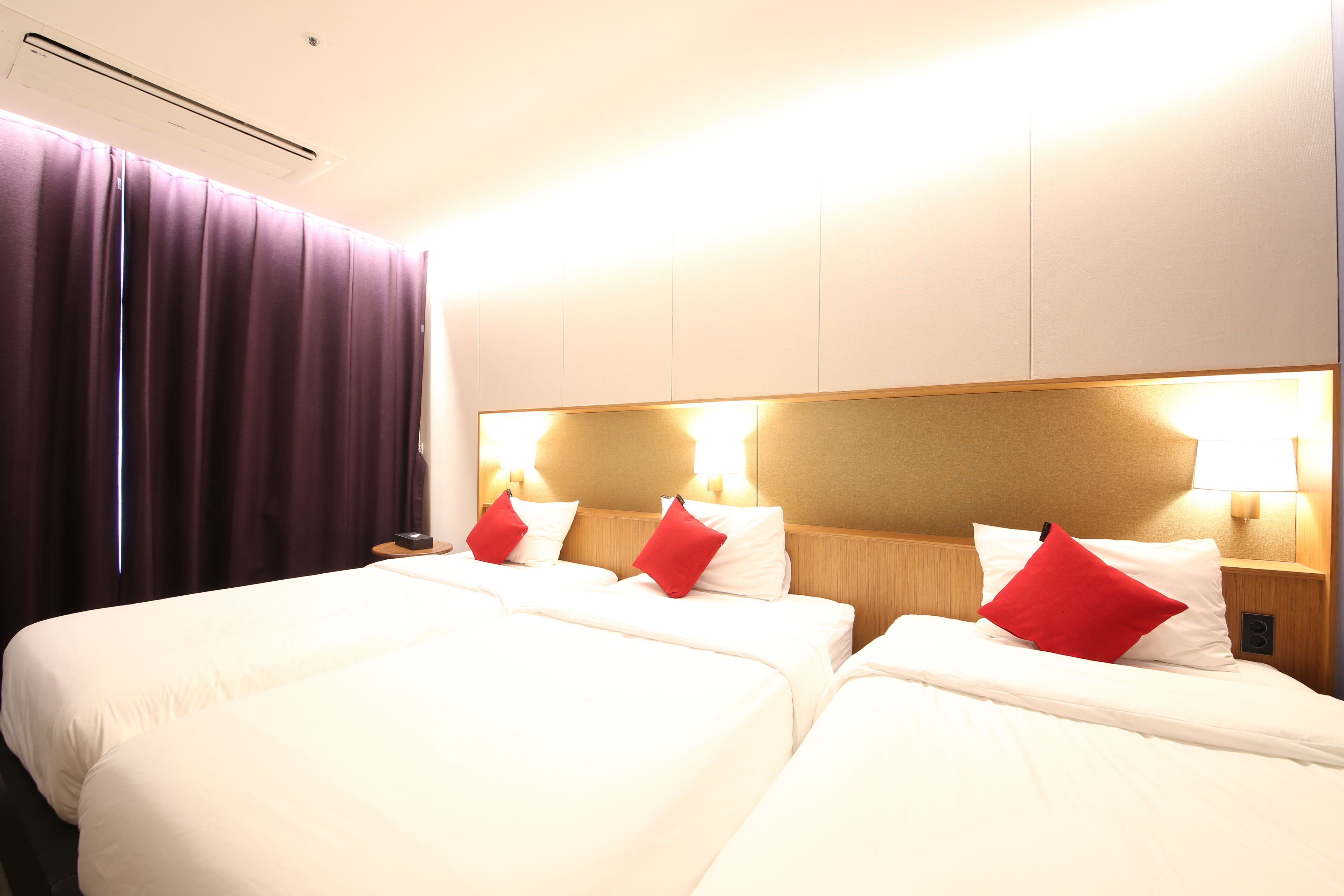 triple single room | premium bedding, blackout curtains, soundproofing, free wifi