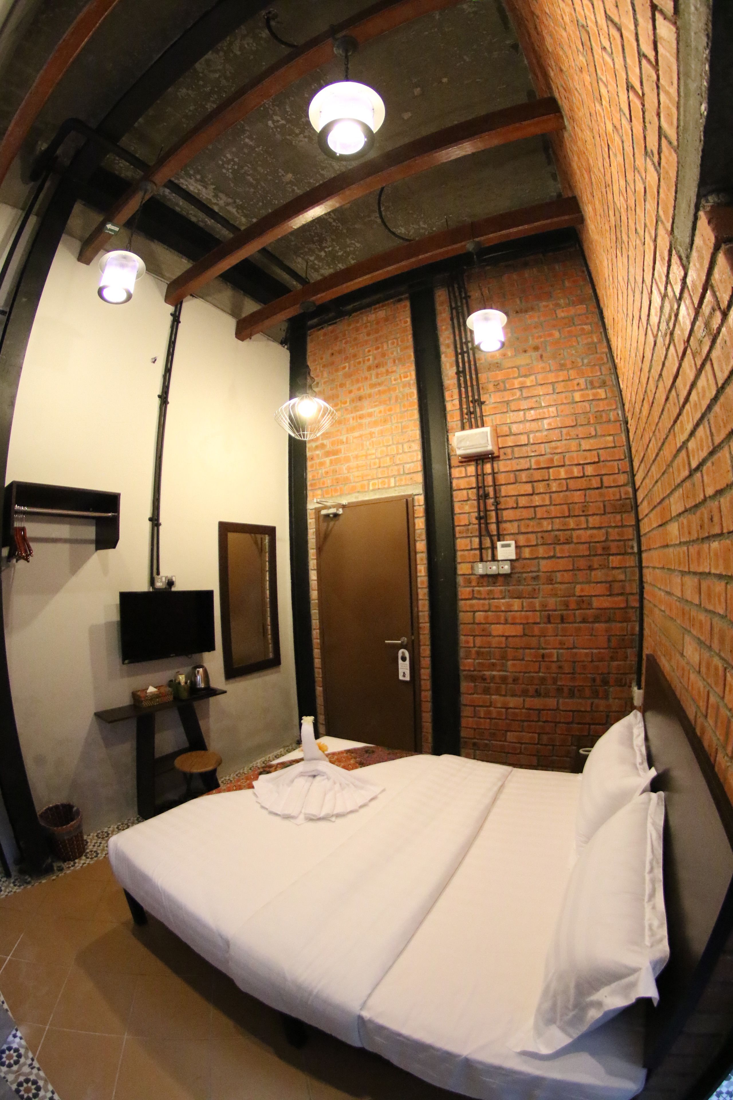 premium double room, ground floor (back view) | in-room safe, desk, iron/ironing board, rollaway beds