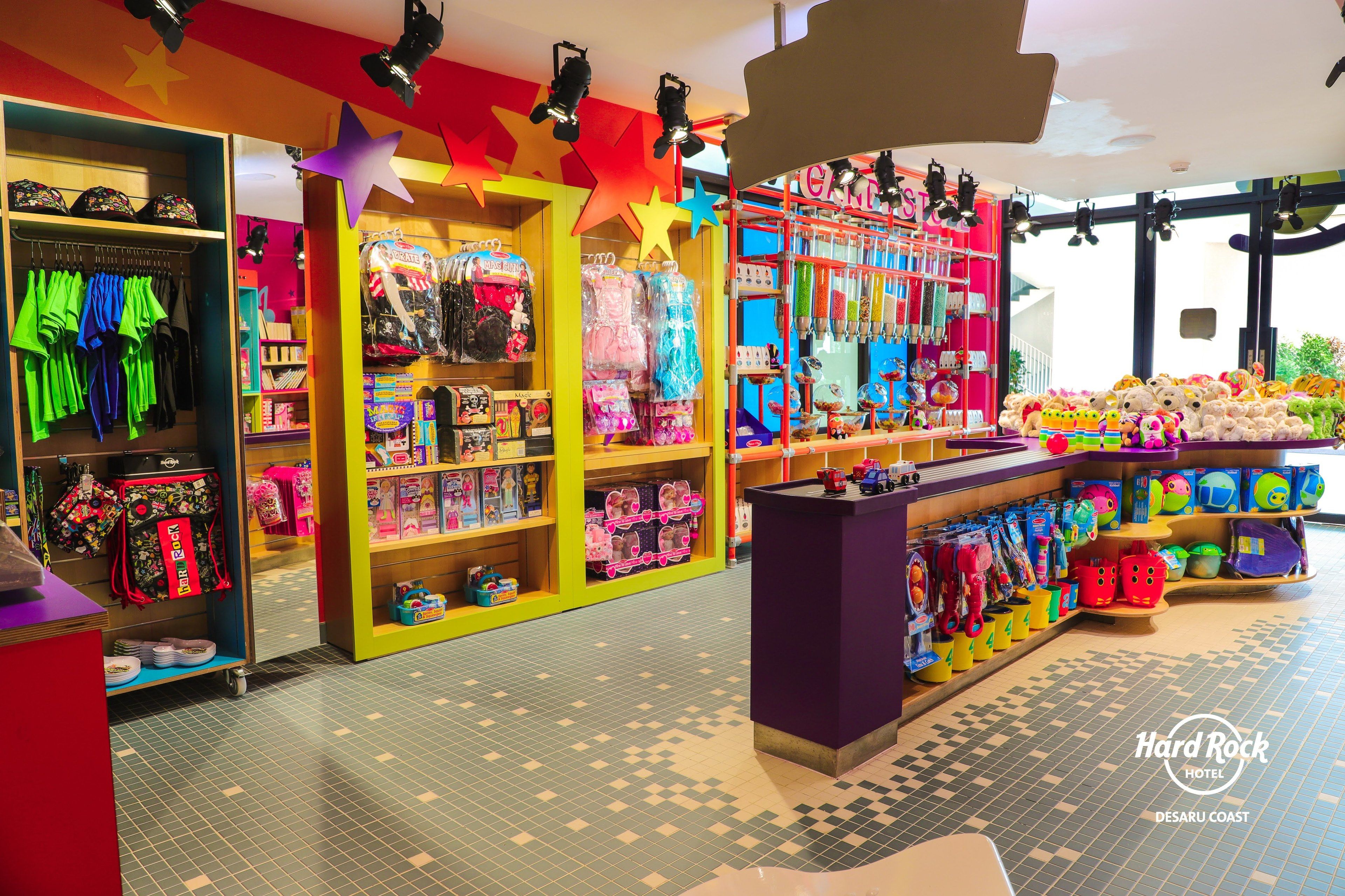 A brightly colored toy store with shelves stocked with various toys and accessories.