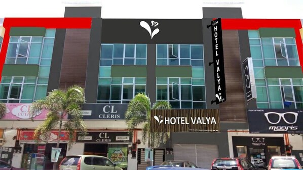 A hotel with a prominent sign reading "HOTEL VALYA" and a logo above the entrance. - Valya Hotel - Kuala Terengganu (Kuala Terengganu)