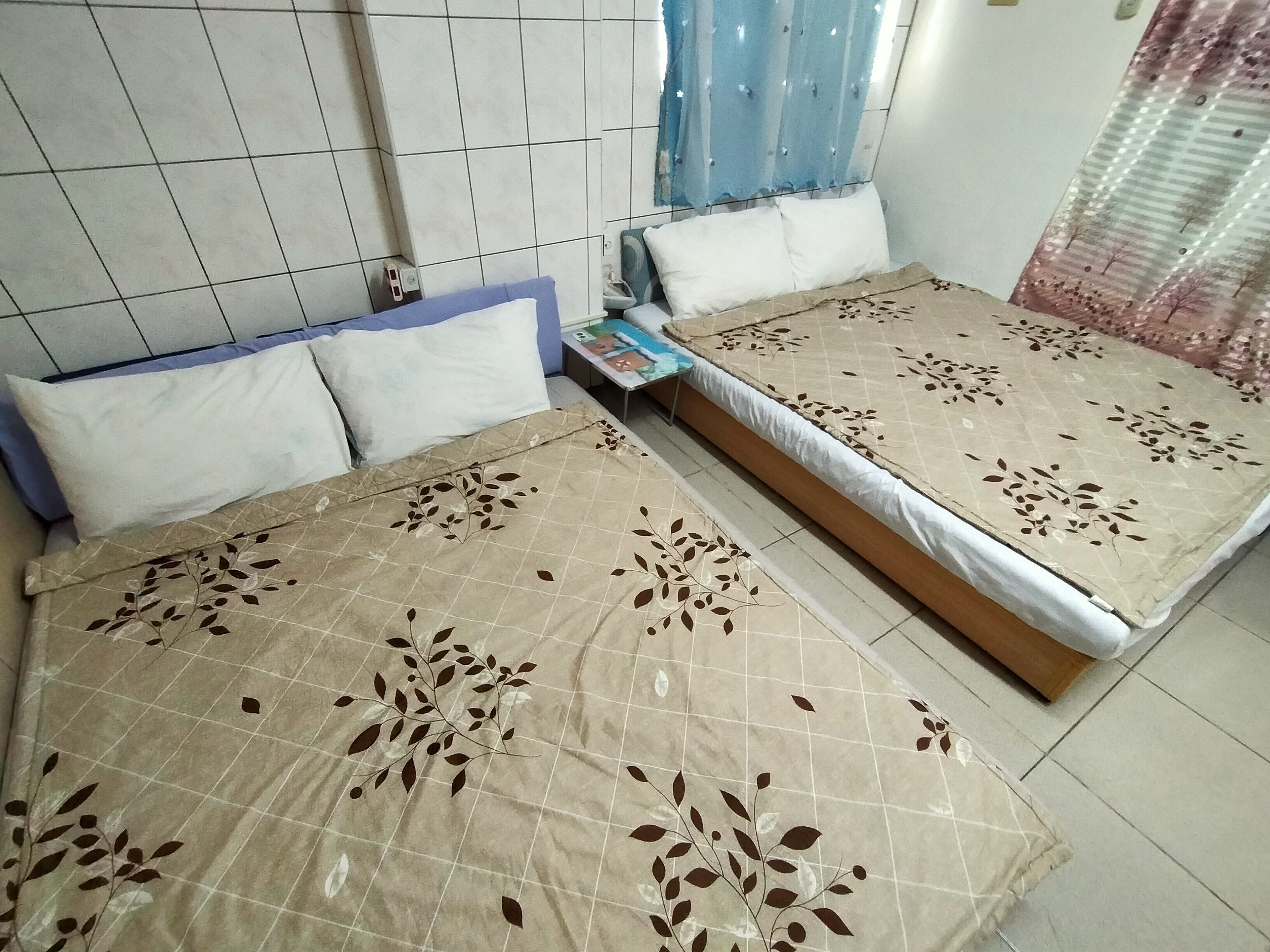 Economy Quadruple Room, Shared Bathroom | Individually decorated, individually furnished, blackout drapes