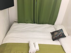 Habitación doble, baño compartido (Subbasement ) | Wifi gratis y ropa de cama