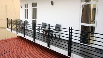 Deluxe Double Room, Garden View | Balcony