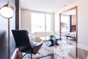 Suite, 1 slaapkamer | Woonruimte | Flatscreentelevisie