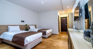 Habitación Deluxe con 2 camas individuales | Cortinas opacas, sistema de insonorización, wifi gratis y ropa de cama