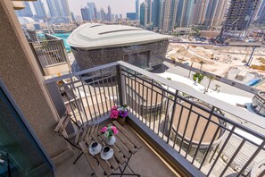 Lägenhet - 2 sovrum | 2 sovrum, värdeförvaringsskåp på rummet och strykjärn/strykbräda