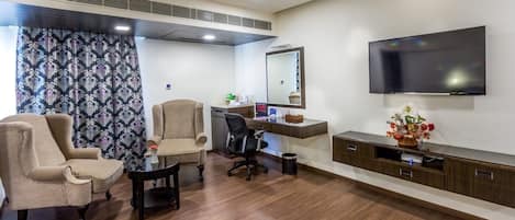 Suite, 1 Double Bed | Living area | Flat-screen TV, pay movies