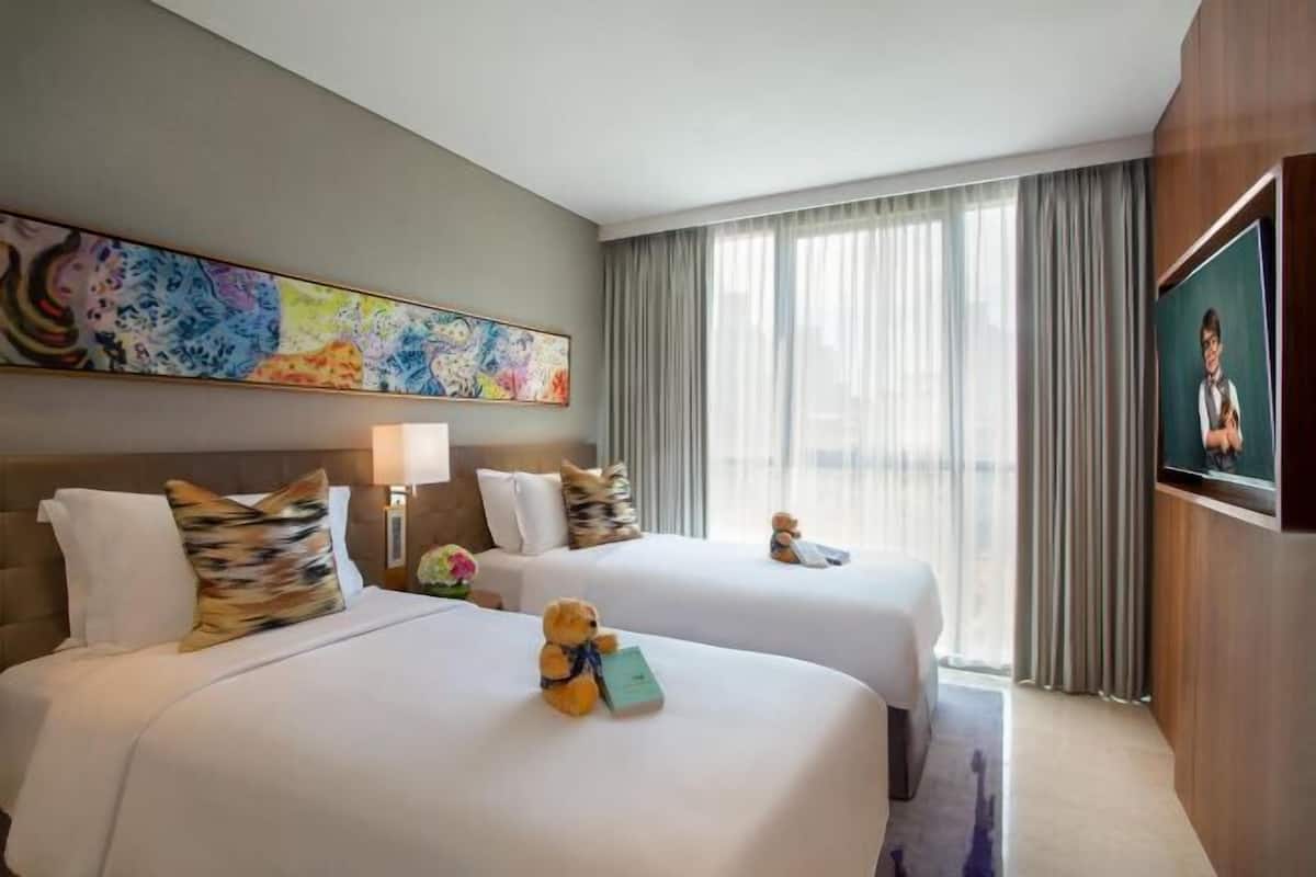 Premium bedding, in-room safe, desk, soundproofing