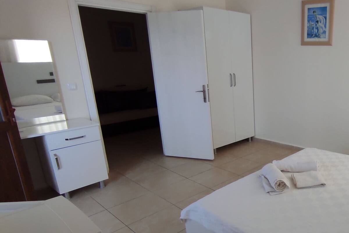 Family Room | Minibar, soundproofing, iron/ironing board (on request), free WiFi