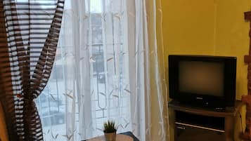 City Apartment, 2 Bedrooms | Living area | Flat-screen TV