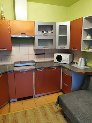 City Apartment, 2 Bedrooms | Private kitchen | Fridge, microwave, stovetop, electric kettle - Orange Studio (Klaipeda)