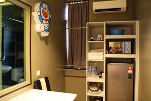 Family Studio Suite | Living area | LCD TV