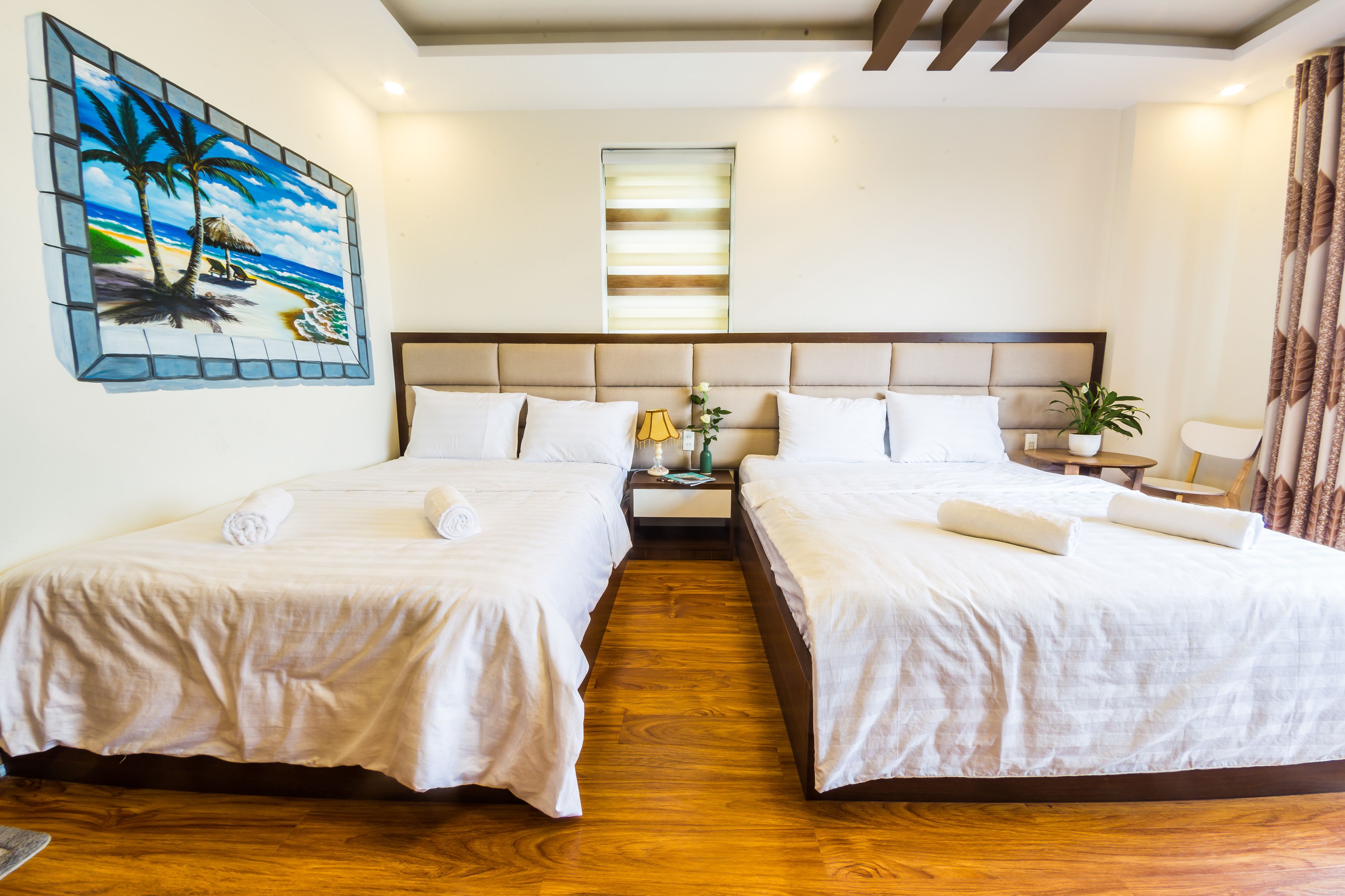 superior quadruple room, 2 queen beds, balcony, city view | minibar, desk, soundproofing, rollaway beds