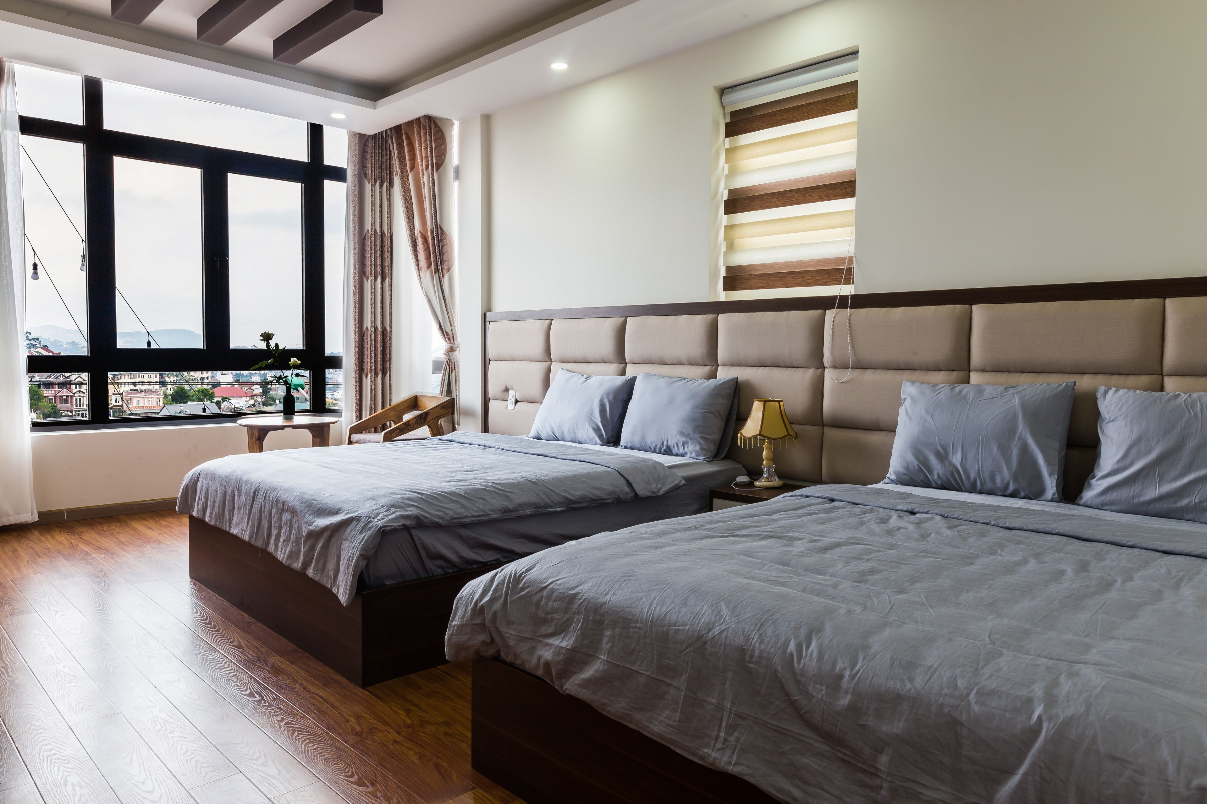 superior quadruple room, 2 queen beds, balcony, city view | minibar, desk, soundproofing, rollaway beds