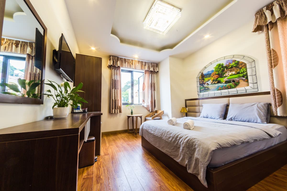 Superior tweepersoonskamer, 1 queensize bed, uitzicht op tuin | Een minibar, een bureau, geluiddichte muren, extra bedden