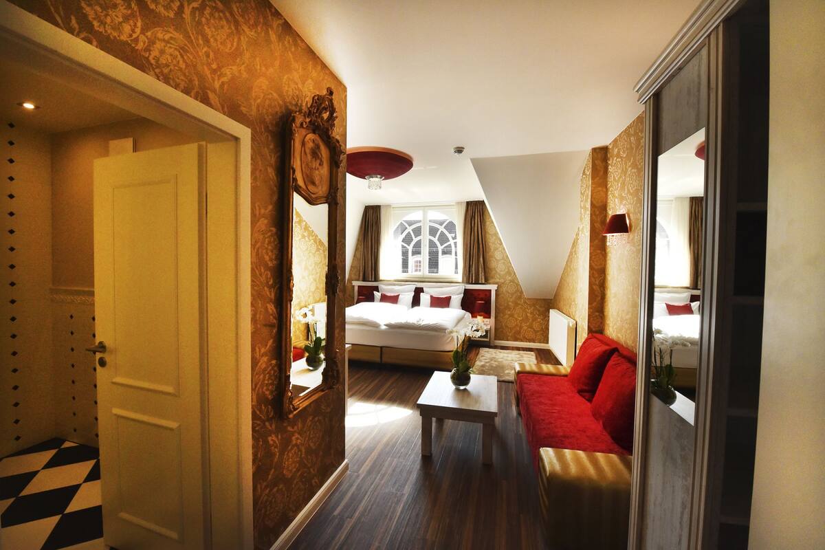 deluxe suite, multiple beds (turmsuite) | premium bedding, in-room safe, individually decorated