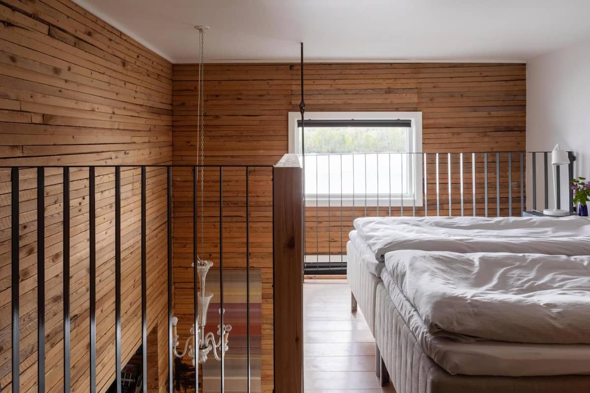 comfort studio suite, lake view (split level with stairs) | 1 bedroom, down duvets, iron/ironing board, free wifi