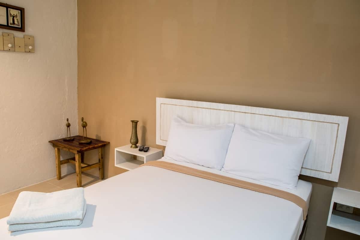 Desk, free WiFi, bed sheets