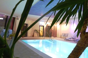 Indoor pool, open 7:30 AM to 9 PM, pool loungers