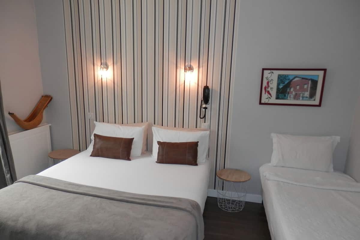 Triple Room | Premium bedding, blackout drapes, soundproofing, cribs/infant beds