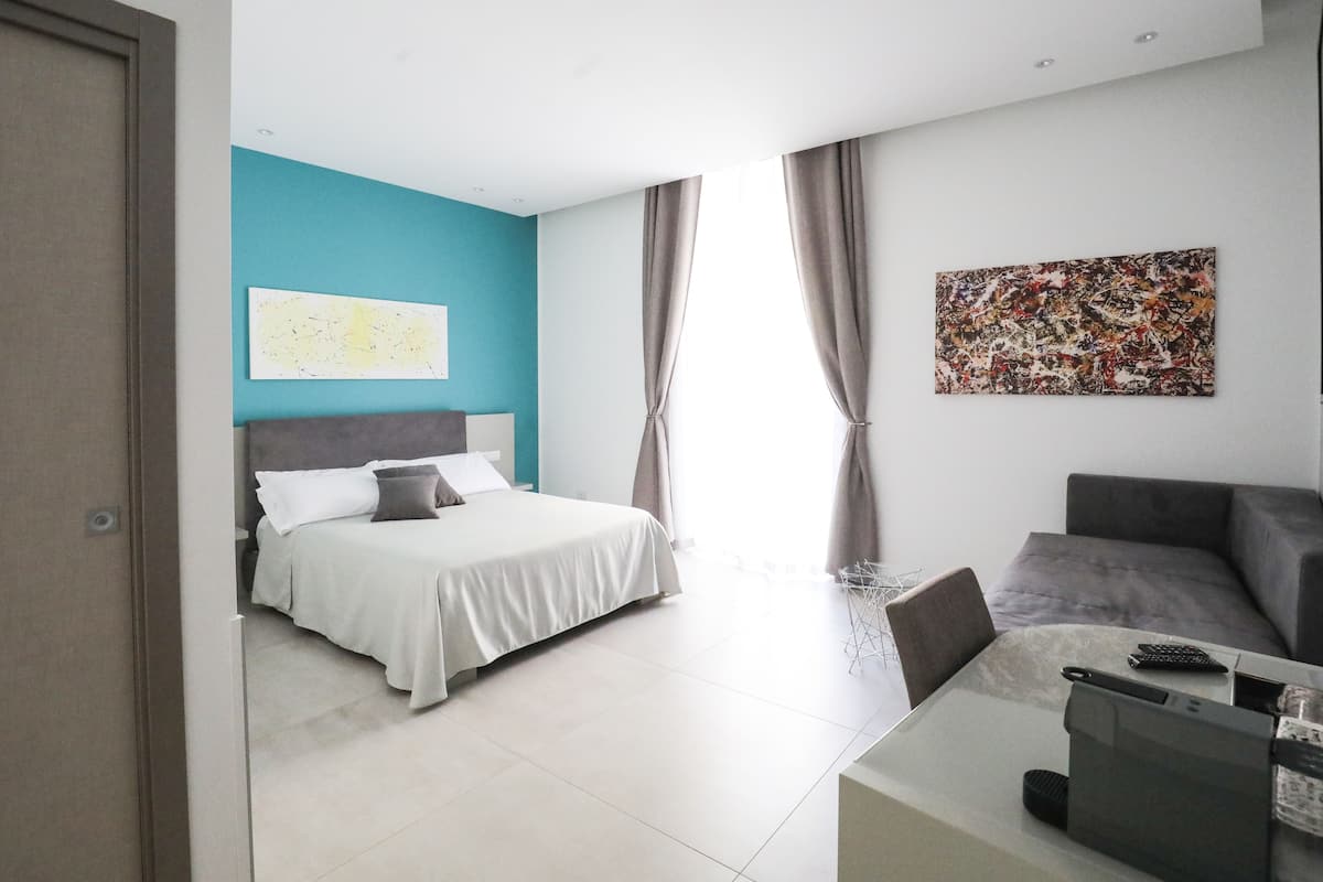 Suite Junior, Bebas Asap Rokok, pemandangan kota | Seprai premium, selimut bulu angsa, brankas, dan didekorasi berbeda-beda