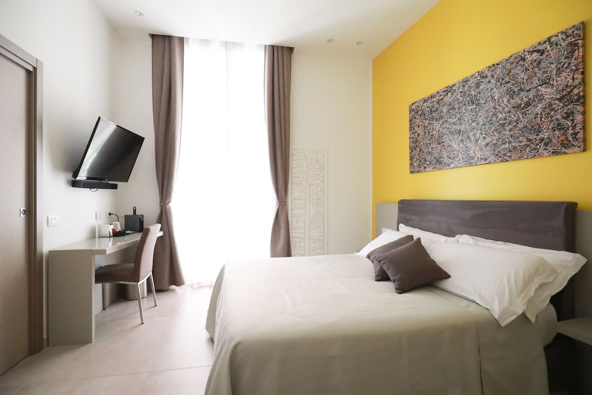 Kamar Deluks, 1 Tempat Tidur Queen | Seprai premium, selimut bulu angsa, brankas, dan didekorasi berbeda-beda