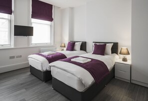 双人房或双床房, 公共浴室 | 客房内保险箱、熨斗/熨板、免费 WiFi、床单