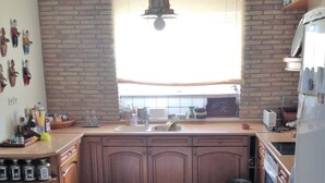 Casa, 3 quartos | Cozinha privada