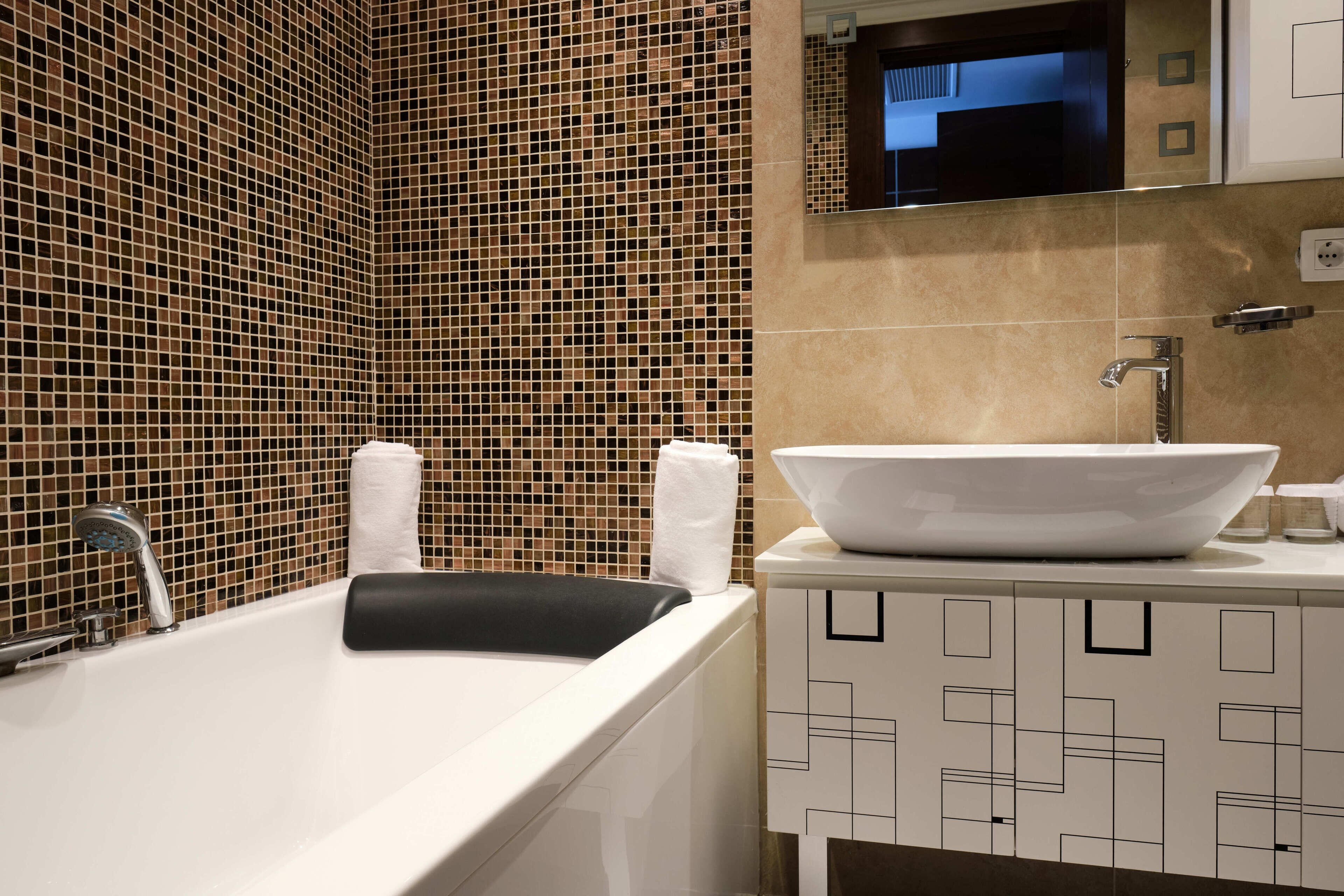 executive suite | bathroom | free toiletries, bathrobes, slippers, bidet