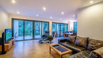 4-Bedroom Pool Villa | Living area | Flat-screen TV