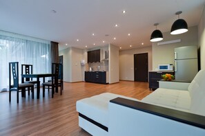 Apartment (Penthouse - Odysseus) | Living area - Aurora Club Spa Resort (Polyanskoye)