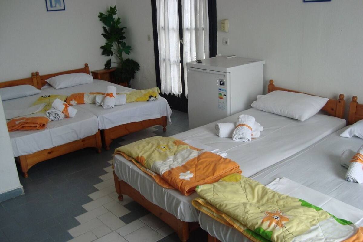 Family Room | Iron/ironing board (on request), bed sheets