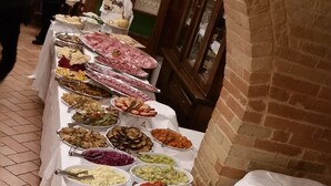 A buffet table with various food items. - L'Oasi di Pierino (Ponzano di Fermo)