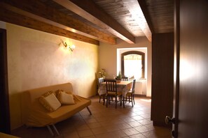 Apartment, 1 Bedroom, Garden View | Living area | Flat-screen TV - L'Oasi di Pierino (Ponzano di Fermo)