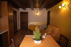 Apartment, 1 Bedroom, Garden View | Living area | Flat-screen TV