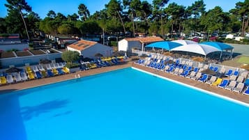 Indoor pool, outdoor pool, open 9:30 AM to 6:30 PM, pool umbrellas