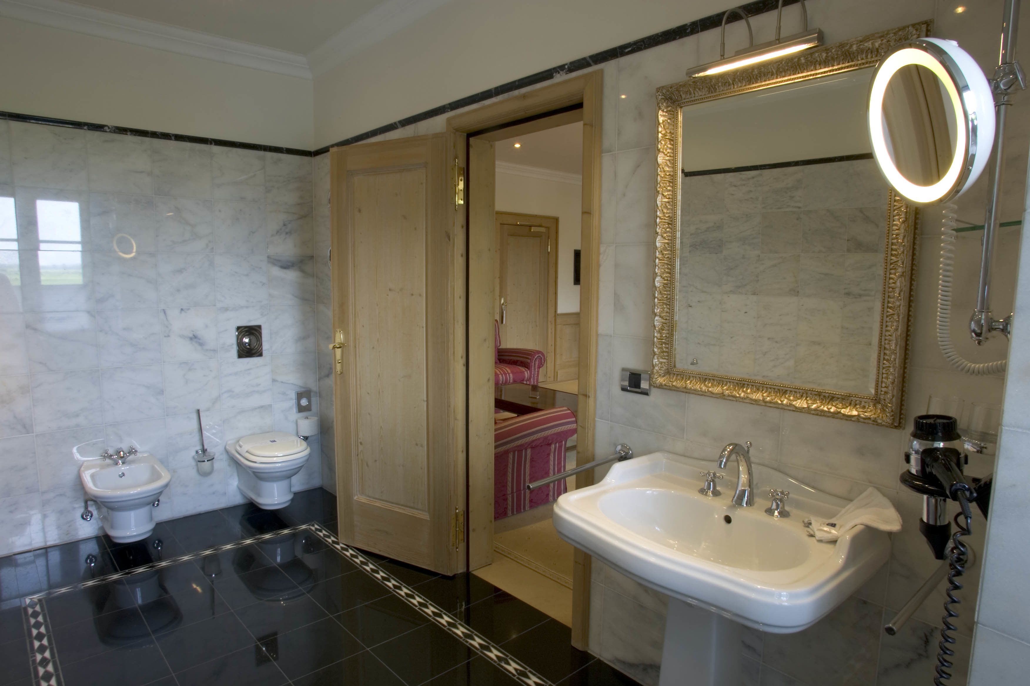superior suite | bathroom | deep-soaking bathtub, free toiletries, hair dryer, towels