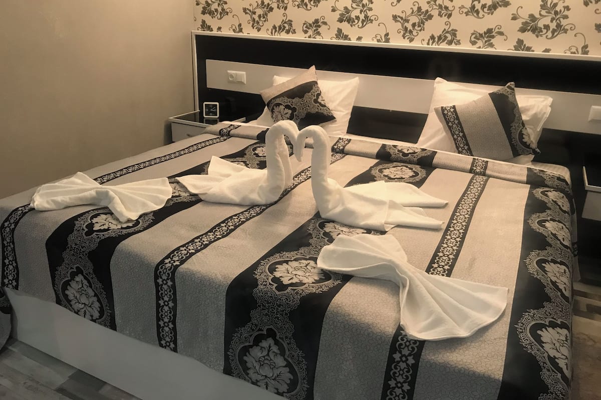 Frette Italian sheets, premium bedding, individually decorated, desk