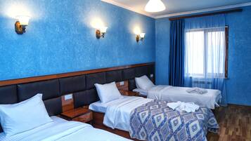 Family Triple Room, 2 Bedrooms, City View | 1 bedroom, Frette Italian sheets, premium bedding