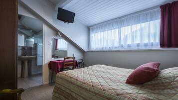 Chambre Simple Standard | Literie de qualité supérieure, coffres-forts dans les chambres, bureau